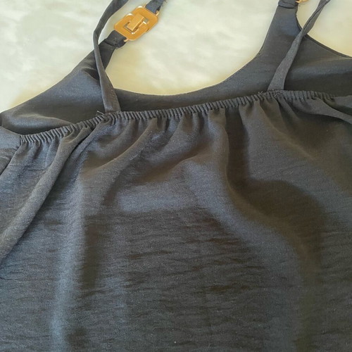 Pack of three shirts like new, two black and one semi-transparent sand color