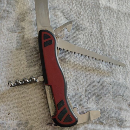 Victorinox Forester pocket knife like new with red and black handles