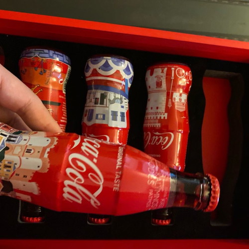 Collectible bottles and book 50 years Coca Cola new