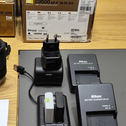 Nikon D3500 DSLR camera body with 3 lenses and accessories