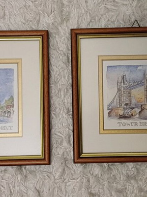 London-themed art prints in wooden frames like new