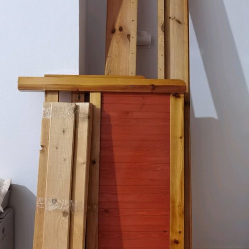 Wooden bed used with slats