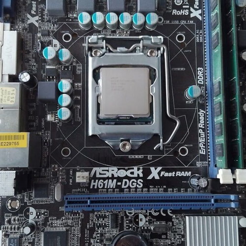 ASRock H61M-DGS motherboard with Intel Pentium G645 CPU, fan and 6GB RAM like new
