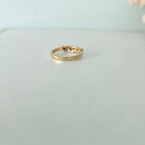 Ring with hearts new, gold color, size 50 diameter 16