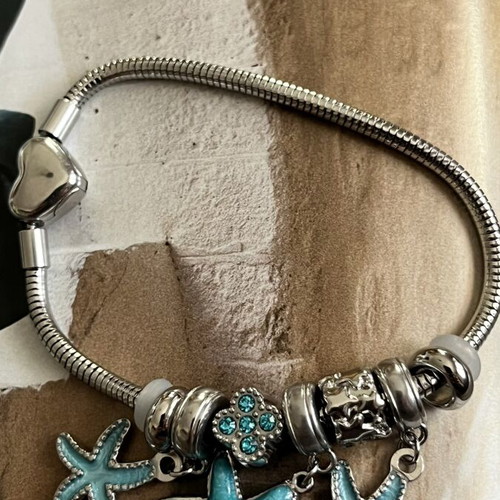 Bracelet stainless steel with turquoise and silver charms new