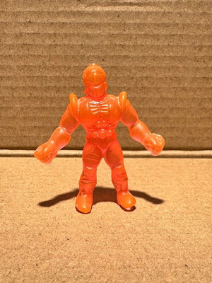 El Greco Exogini alien figure used, transparent orange