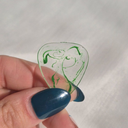 Green guitar pick made of resin new