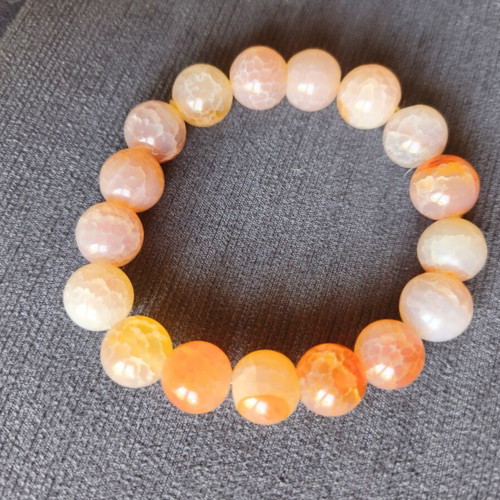 Bracelet with orange beads elastic, like new
