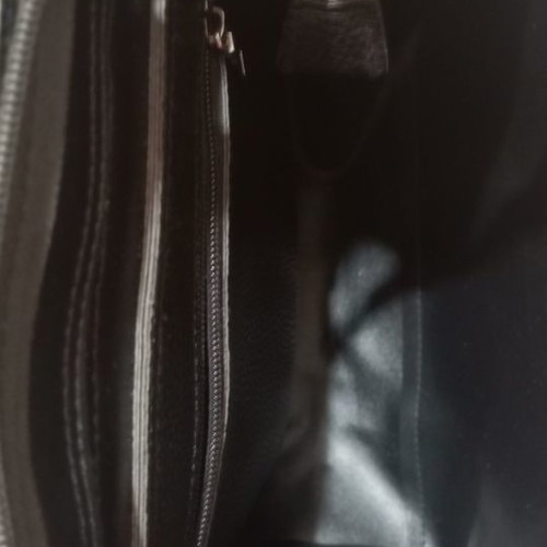 Black synthetic backpack bag used