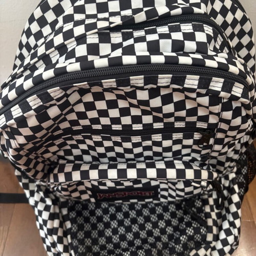Jansport black and white checkerboard backpack with laptop compartment