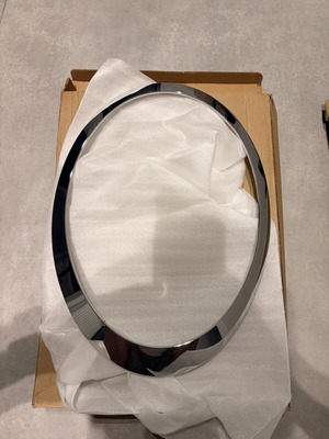 Mini Cooper R56 left headlight frame new