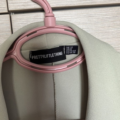 Loose pistachio jacket with brown buttons like new