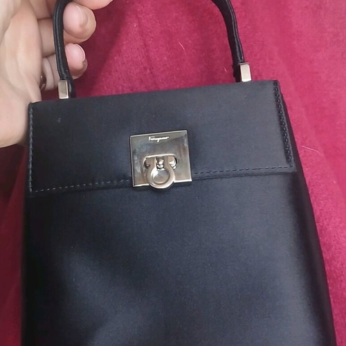 Salvatore Ferragamo evening bag like new, black satin with silver clasp