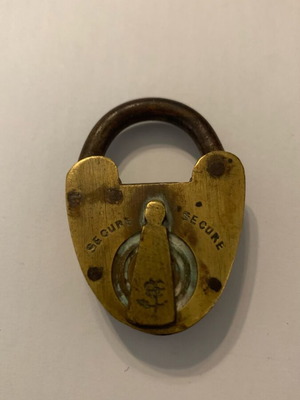 Old padlock used, key missing
