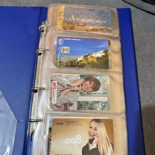 Album with 50 various phone cards like new