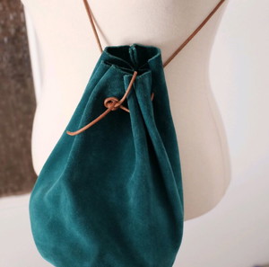 Mini turquoise suede leather bucket bag we wear young