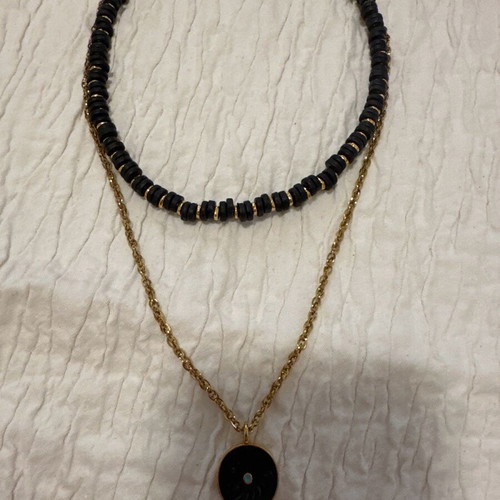Necklace set used with black and gold beads and steel chain