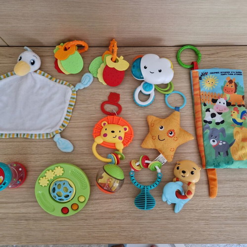 Baby toys like rattles, teethers and soft activity books, like new
