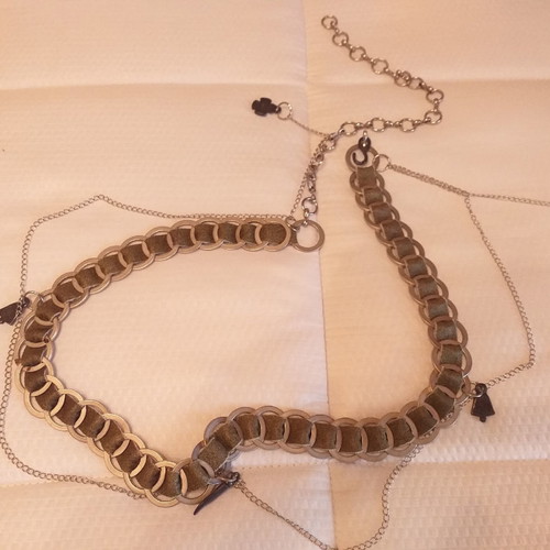 Metal belt with oil leather and chains
