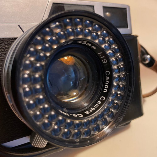 Canon Canonet vintage camera with 45mm f/1.9 lens and leather case like new