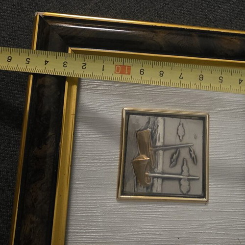 Decorative frame with embossed metal artwork used, made in Italy