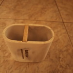 Toothbrush holder with marble effect resin