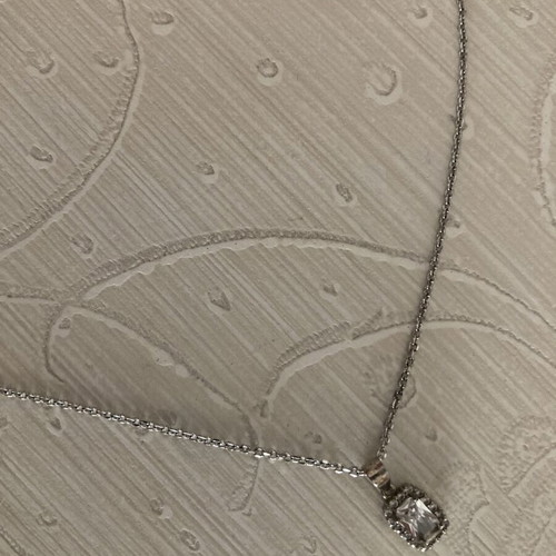 Kostis Jewellery stainless steel necklace with square rosette pendant and white zircon stones like new