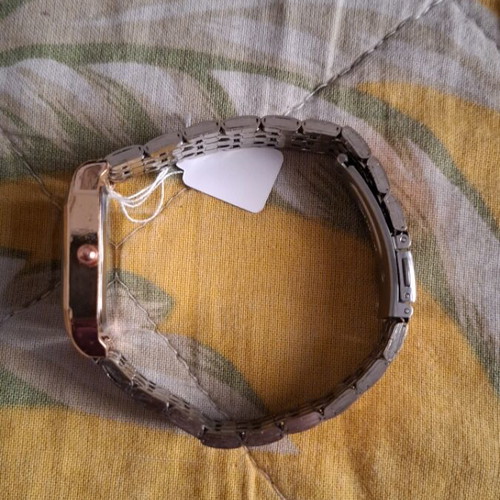 Wristwatch new, pink gold and silver with bracelet