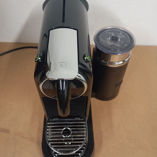 Delonghi Nespresso coffee machine with milk frother