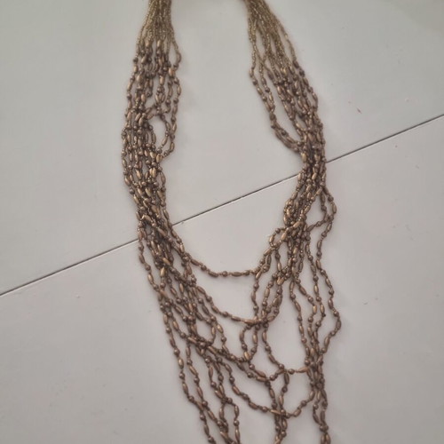 Necklace used, gold color