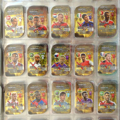 Complete album with European football magnetic metal tags, foil