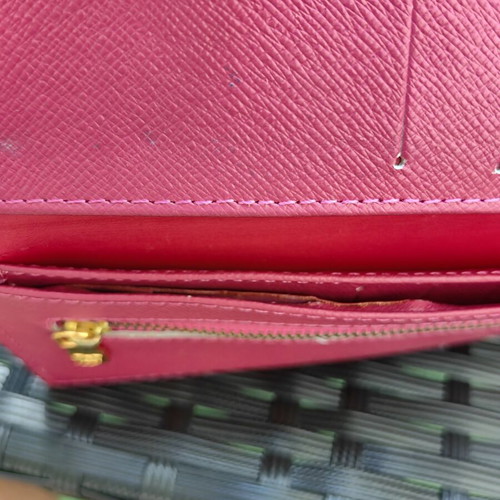 Louis Vuitton wallet used, authentic with visible marks inside