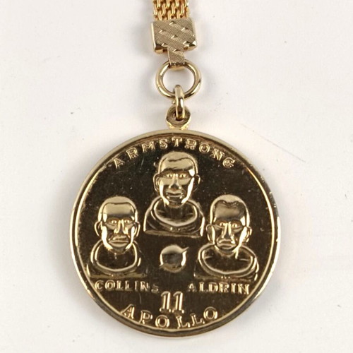 Apollo 11 collectible bronze medal and gold-plated keychain like new
