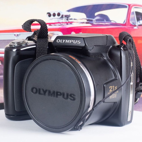 Olympus SP-620UZ Digital Bridge Camera used with slight battery door gap