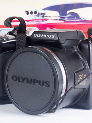 Olympus SP-620UZ Digital Bridge Camera used with slight battery door gap