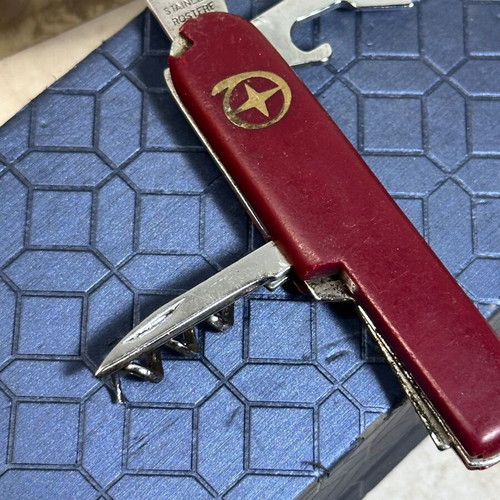 Vintage pocket multitool 6 in 1 with corkscrew and openers used