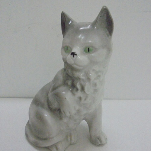 Vintage porcelain cat figurine, white-gray with green eyes