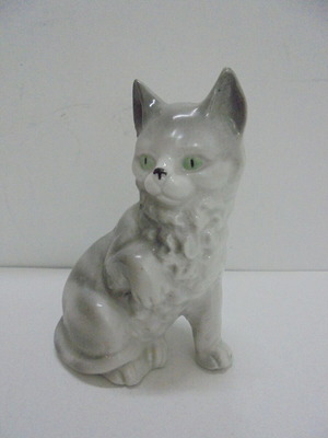 Vintage porcelain cat figurine, white-gray with green eyes