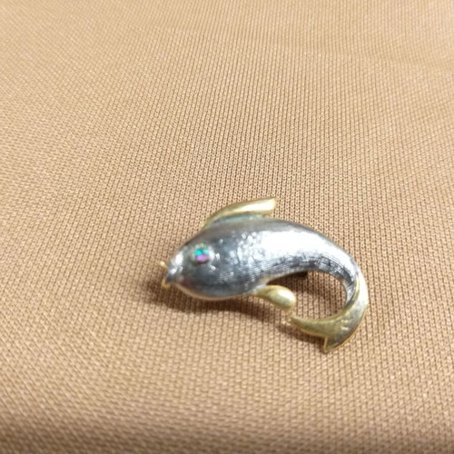 Dolphin pin used, silver and gold color