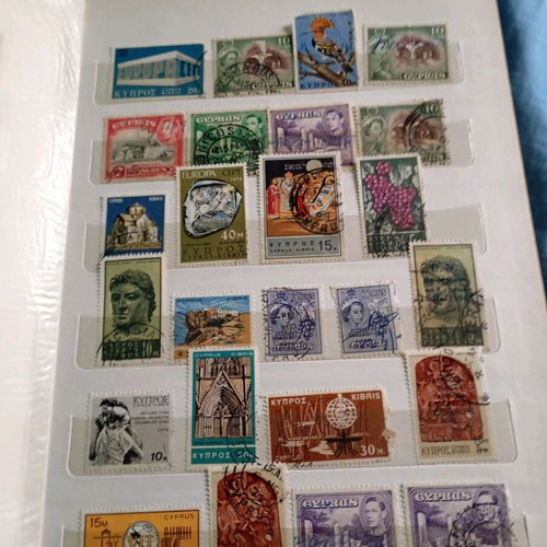 Two stamp albums with stamps from around the world