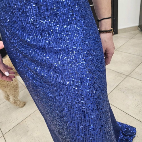 Diamond blue dress like new, open back with shoulder pads