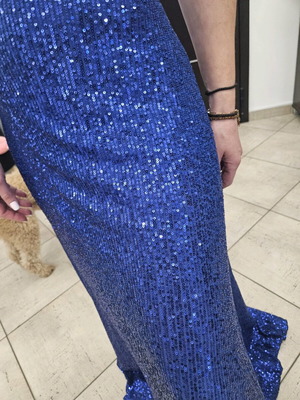 Diamond blue dress like new, open back with shoulder pads