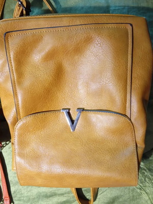Backpack and small bag used, brown and orange