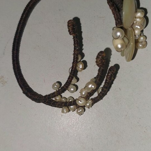 Vintage handmade bracelet with beaded flower used