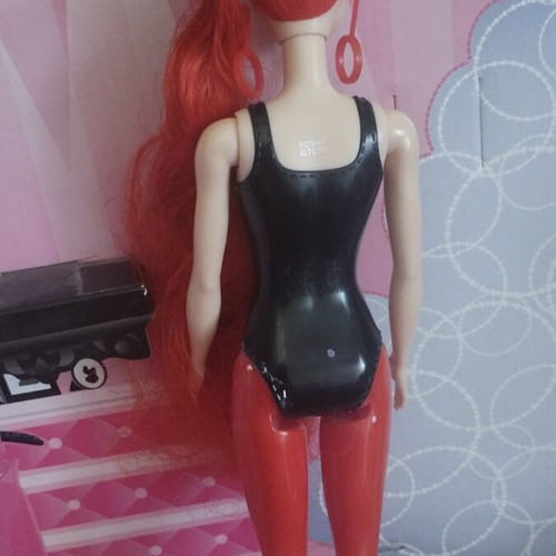 Barbie Colour Reveal doll with red dress