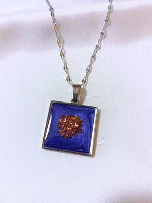 Necklace new in purple blue color with golden stones
