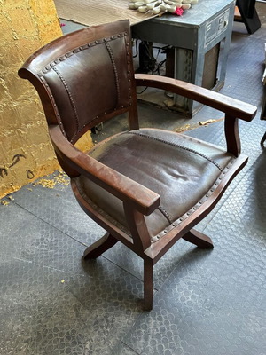 Wooden swivel office chair with leather upholstery