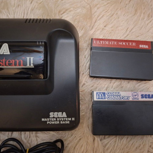 Sega Master System II used with 2 cartridges and new power supply