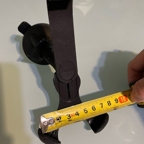 Phone holder used for car with self-adhesive system