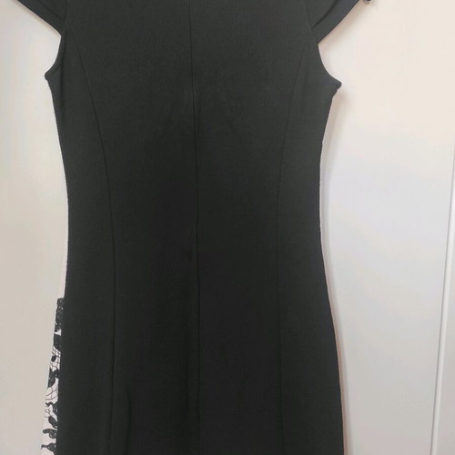 Mini dress like new, black and white with decorative buttons
